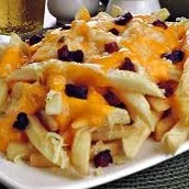 Porção de Batata com cheddar e bacon 250 g (Peso in natura)