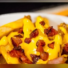 Porção de Batata C/ Cheddar e Bacon