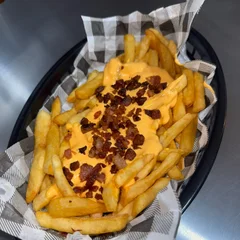 Porção batata cheddar cremoso artesanal e bacon M