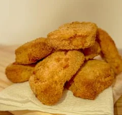 Porção Nuggets + Molho Grátis