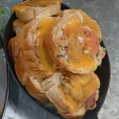 Porção de pão gratinado 