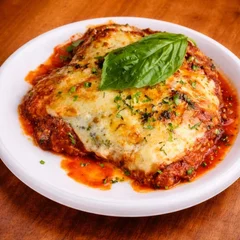Parmegiana De Contra File Com Salada De Macarrao Ou Pure De Batata