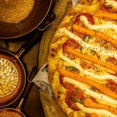 2 deliciosas pizzas grandes