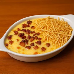 Batata Recheada de Carne moída com Catupiry, Muçarela, Bacon e Batata Palha