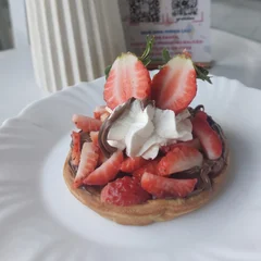 Waffle, nutella e fruta