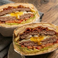 X-Bacon (Burguer Caseiro, Bacon, Presunto, Queijo, Alface e Tomate)