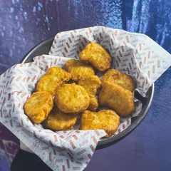 Porção nuggets