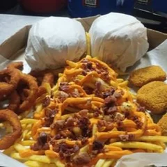Combo na caixa de pizza 2 xtudos, turbinada, nugets e onions