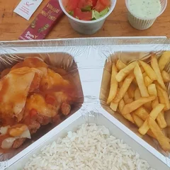 Parmegiana de frango + Acompanhamento