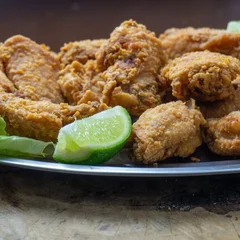 Porção de Frango à Passarinho