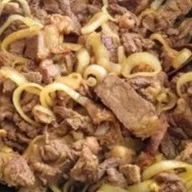 64-Picadinho de Gado Acebolado 500g