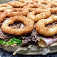 38-TRADICIONAL COSTELA DESFIADA COM BACON E ANÉIS DE CEBOLA 