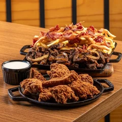 Porção Big Zé: Contra Filé Acebolado, Batata Frita Crocante, Frango Empanado