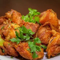 Frango à Passarinho